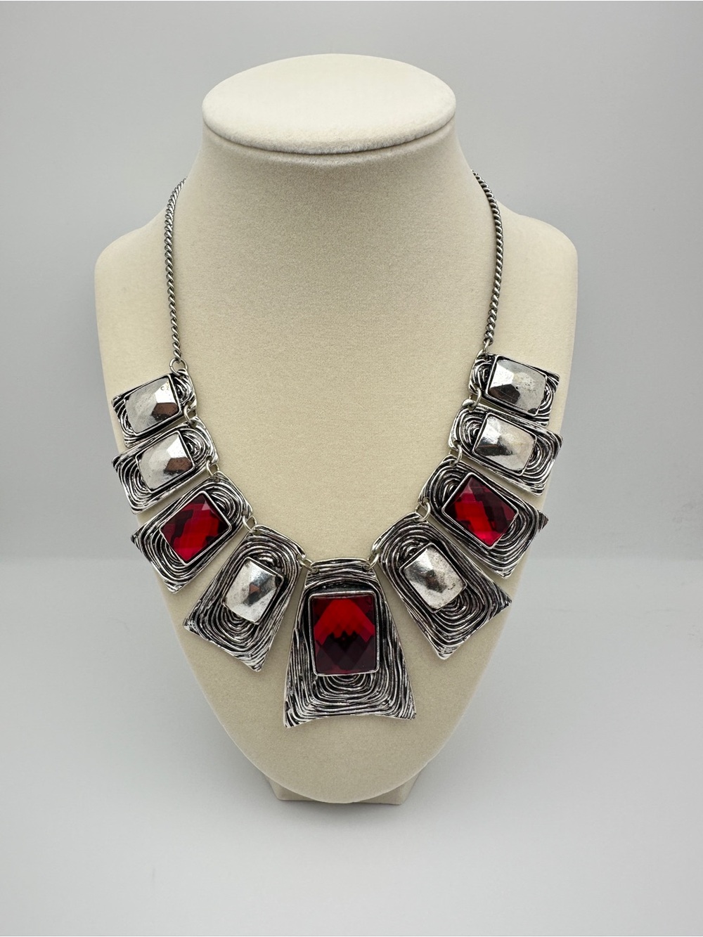 Silver-Tone Statement Necklace with Red Gem Accents